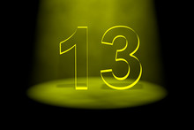 Number 13 Illuminated With Yellow Light