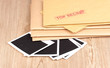 Envelopes with top secret stamp with photo papers close-up