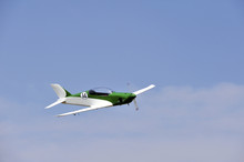 Ultralight Airplane Flying In The Sky
