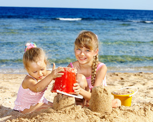 Children  playing on  beach.