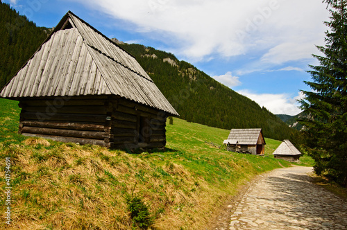 Board z aluminiowym obramowaniem Tatry-dolina chochołowska bacowki
