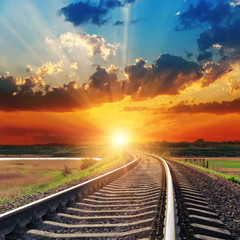 Wall Mural - dramatic sunset over railroad