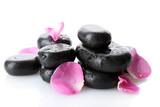 Fototapeta Storczyk - Spa stones with drops and rose petals isolated on white