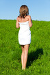 © nakedking - Woman with towel on meadow
