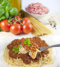 Spaghetti Pasta On Fork And Ingredients