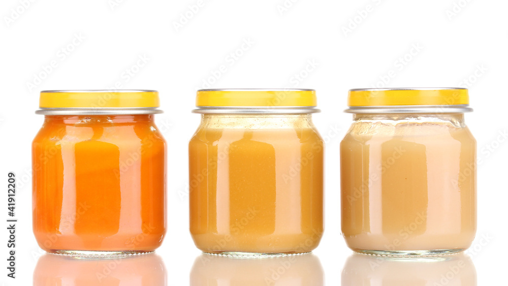 Jars of baby puree isolated on white