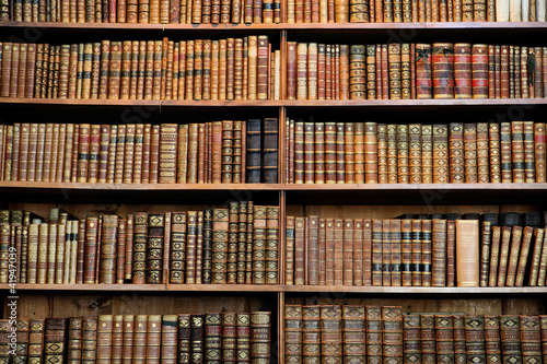 Nowoczesny obraz na płótnie Antique book racks in an old library in Vienna