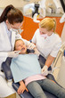 © CandyBox Images - Child dental checkup at stomatology clinic