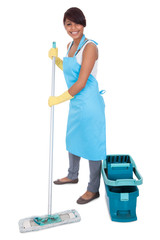 Cheerful woman having fun while cleaning