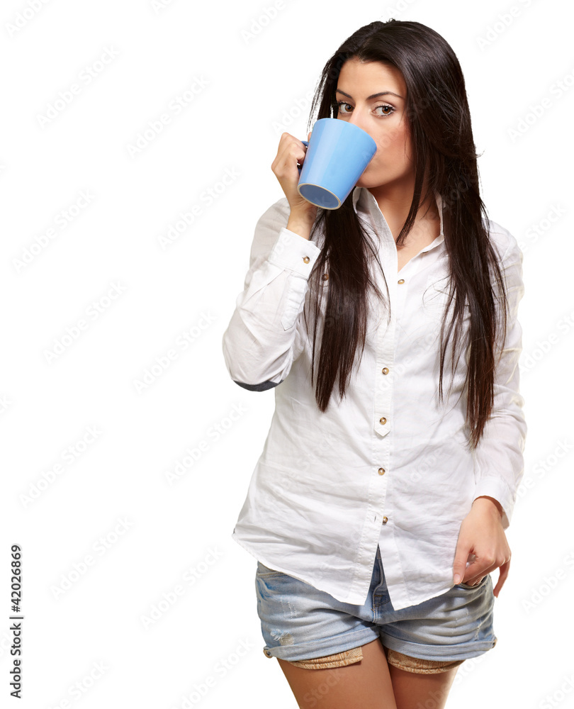 portrait of young woman drinking over white background
