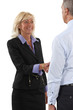 © auremar - Two senior businesspeople shaking hands