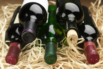 Poster - Wine bottles in straw