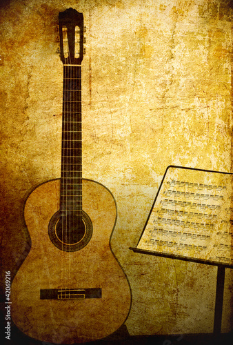 Board z aluminiowym obramowaniem Gitara klasyczna z nutą stoiska w tle grunge