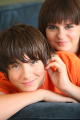  portrait of teenage boy and sister