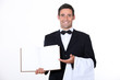 © auremar - Waiter presenting menu