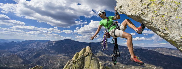 Climber rappels.