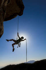 Climber rappelling from the summit.