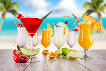 Canvas Print - Summer drink with blur beach on background