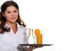 © auremar - Waitress carrying tray of drinks