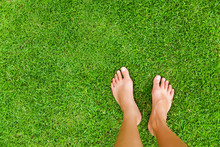 Foot Over Green Grass