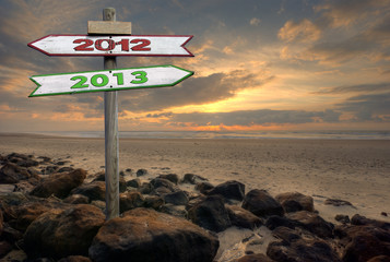 Double directional signs on a beach 2012 to 2013