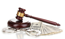 Dollar Banknotes, Handcuffs And Judge's Gavel Isolated On White