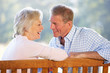 © Monkey Business - Senior couple sitting outdoors