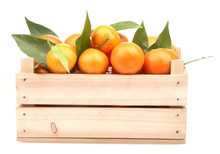 Ripe Tasty Tangerines With Leaves In Wooden Box Isolated