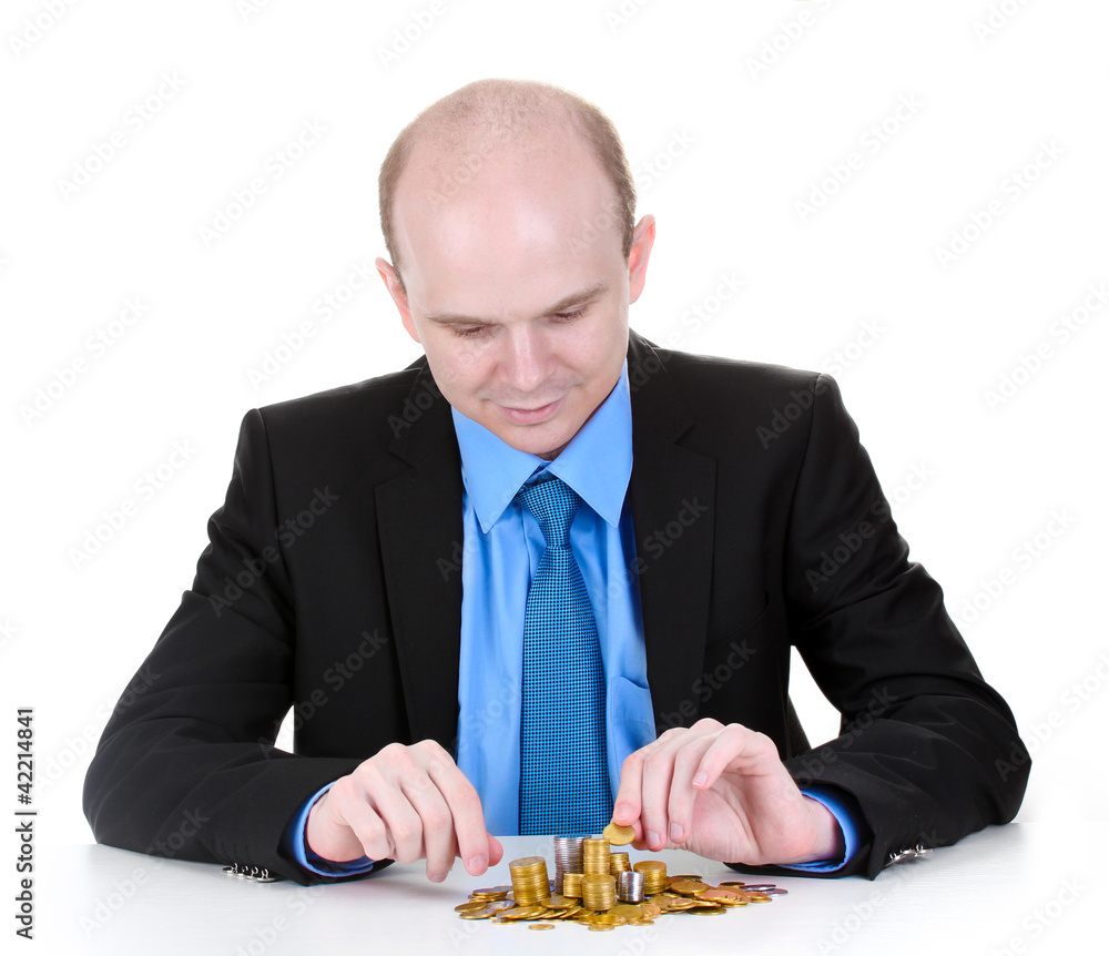 Businessman put coins isolated on white