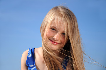 Wall Mural - Portrait of beautifull little girl at beach