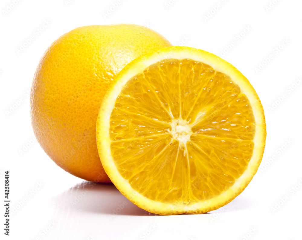 One Full Orange Fruit With A Cut Half