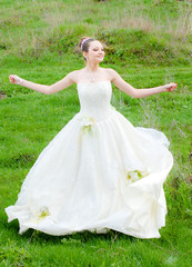 Canvas Print - happy beautiful bride on wedding day outdoors