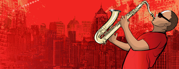 Wall Mural - saxophonist on a grunge background