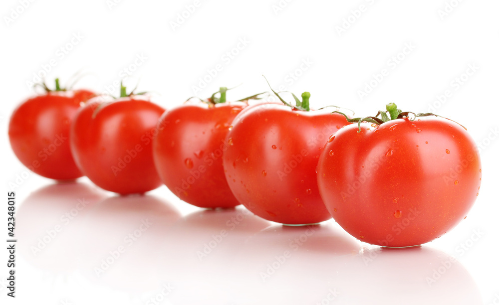 Fresh tomatoes isolated on white