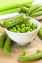 Fresh Green Peas On The White Bowl