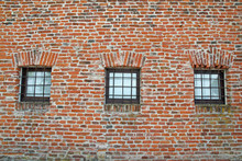 Brick Wall With Iron Lattice Window Of An Ancient Prison