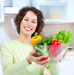 Wall Mural - Beautiful Young Woman with healthy food