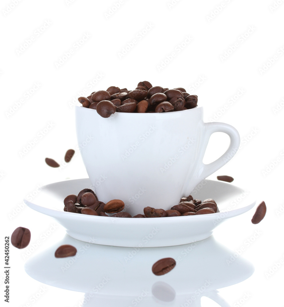White cup with coffee beans isolated on white