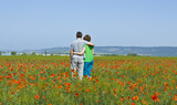 Fototapeta Kuchnia - Couple on meadow with poppies