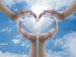 © chanpipat - Hand holding heart cloud