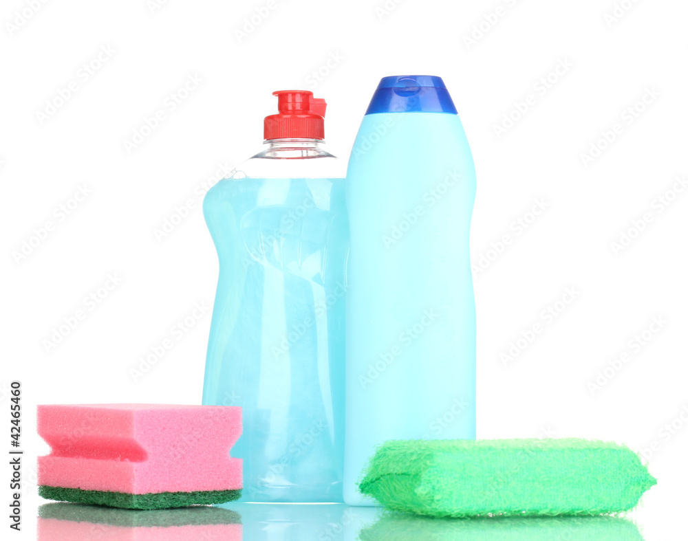 Dishwashing liquids and sponge isolated on white