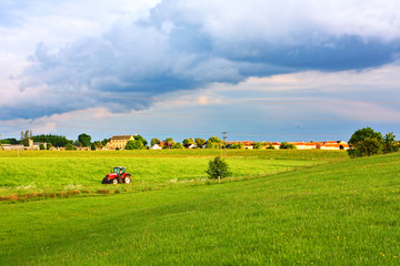 Poster - A red tractor in the fields of Scotland, Springtime