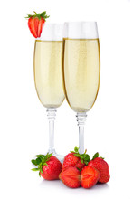 Two Glasses Of Champagne And Fresh Strawberry Isolated On White