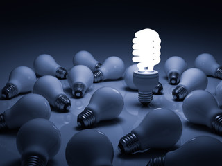 Fototapete - Lit energy saving lightbulb amongst unlit incandescent bulbs