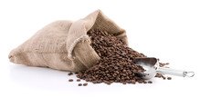 Burlap Sack Full Of Coffee Beans With Metal Scoop