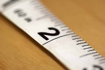 Tape measure number 2 shallow depth of field showing the number 2 clearly and the measurement bars of fractions of inches