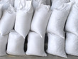 White sacks full with sand and rock