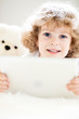 © Sunny studio - Child using tablet pc