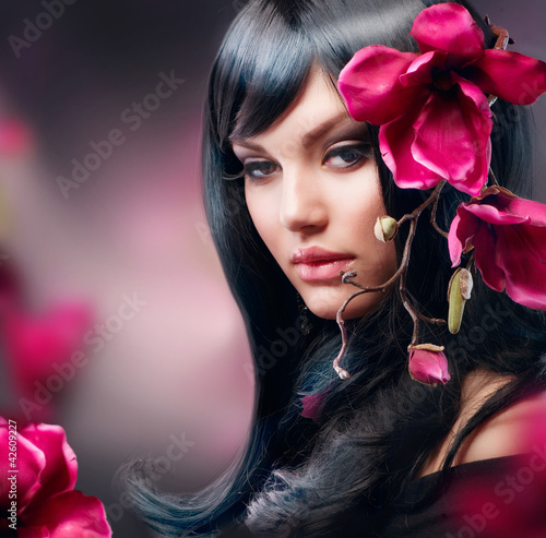 Fotoboard na płycie Moda brunetka dziewczyna z kwiat magnolii