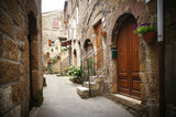 Fototapeta Uliczki - typical italian narrow street